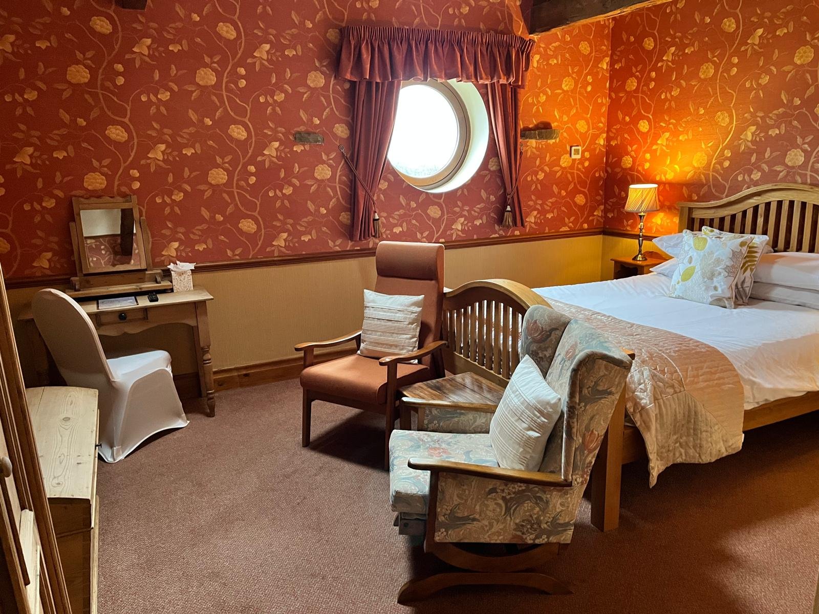 king terracotta room at the Dog and Partridge Inn